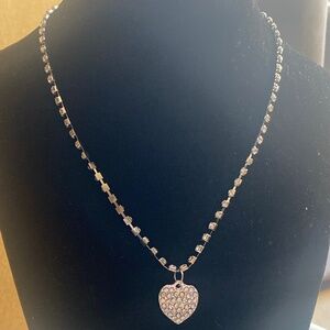 Silver tone necklace with rhinestones 8in and a pendant heart